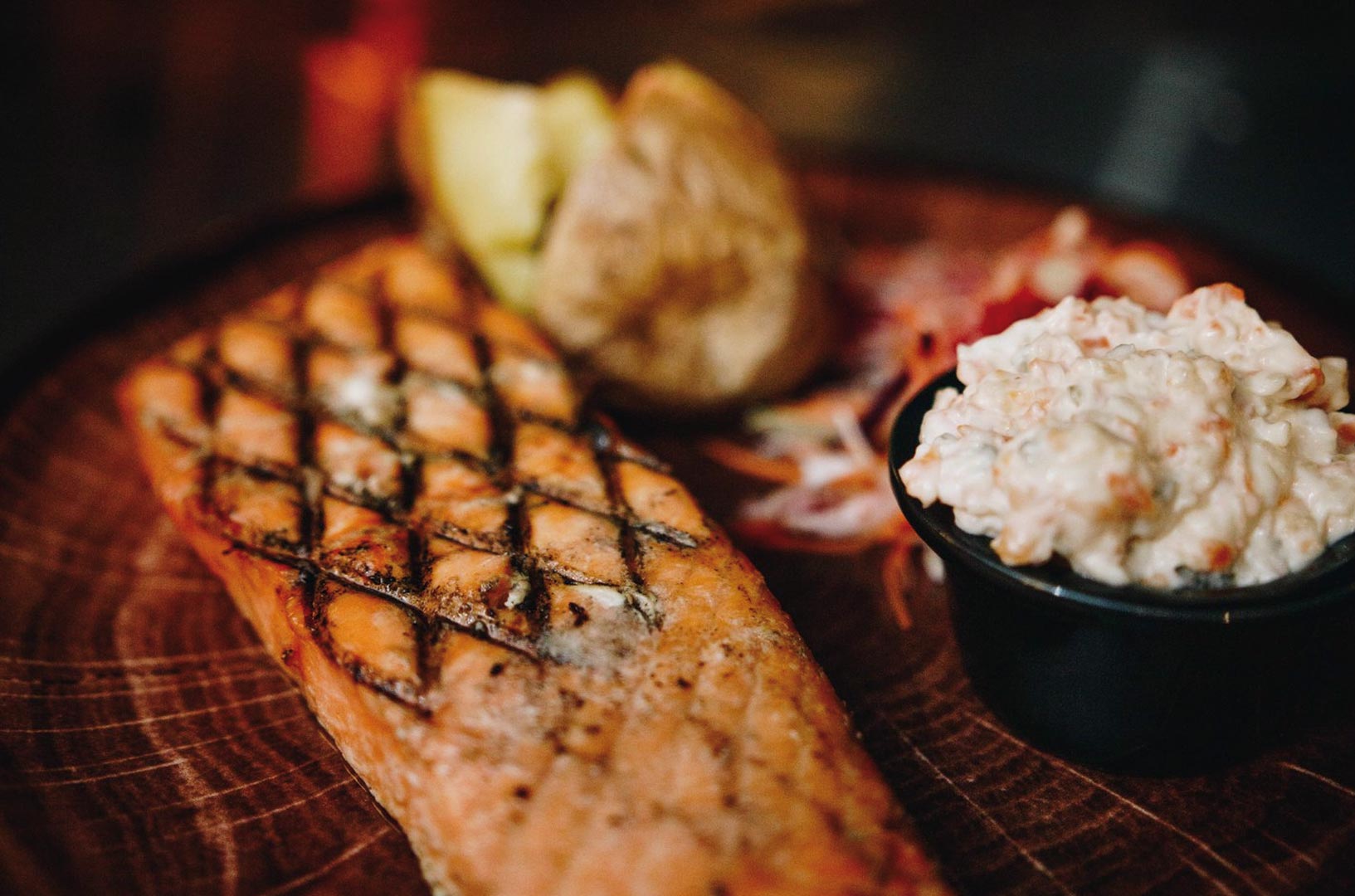 flame-grilled salmon and baked potato